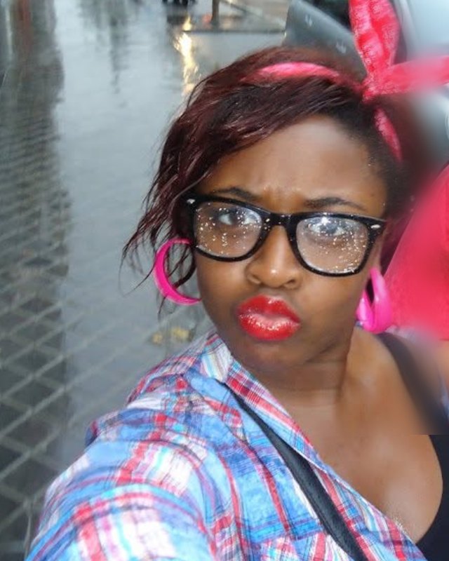 Magnolia on a rainy street with glasses and a red headband