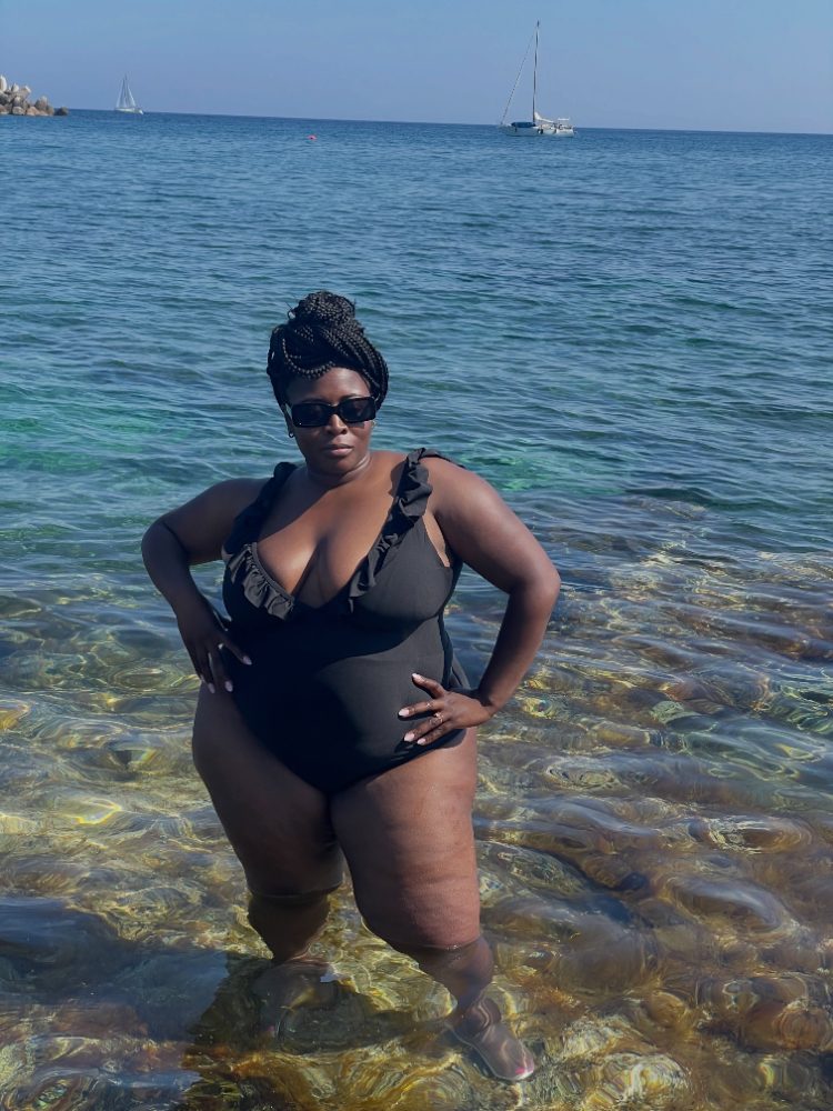 Magnolia at the sea in a swimsuit